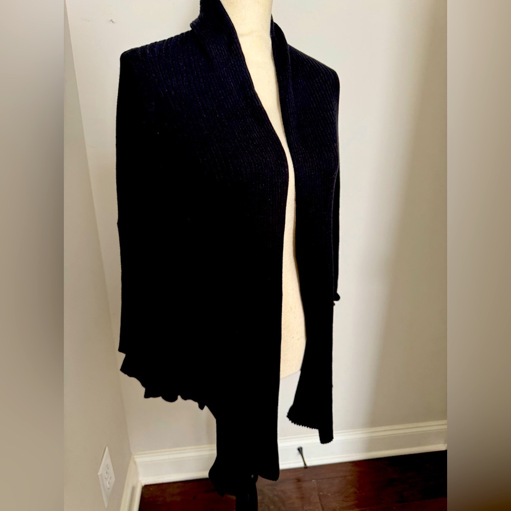 Soft surroundings, black cardigan sweater with ruffle trim. Size M-never worn.
￼